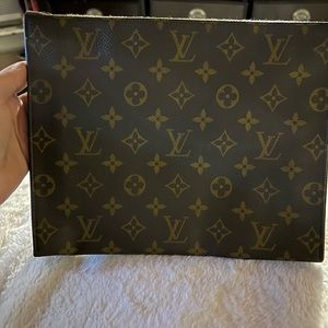 Authentic Louis Vuitton toiletry pouch